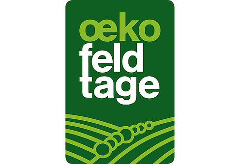 Logo Oekofeldtage mit Schriftzug weiss und hellgrün auf dunkelbrün