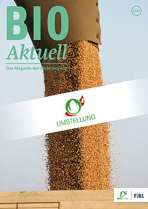 Titelseite Bioaktuell 8|2022: Abfüllung von Mahlweizen