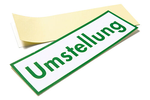 Etikette mit der Aufschrift "Umstellung"