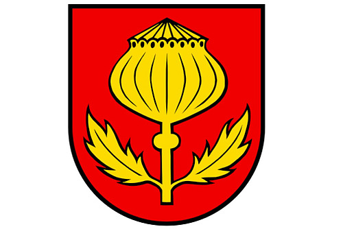 Auf einem roten Wappen ist in gelb eine stilisierte Mohnkapsel mit zwei Blättern abegebildet. 